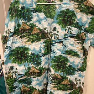3/$25 on $10 scrub tops! Nique Tropical Print Scrub Shirt - Green and Blue